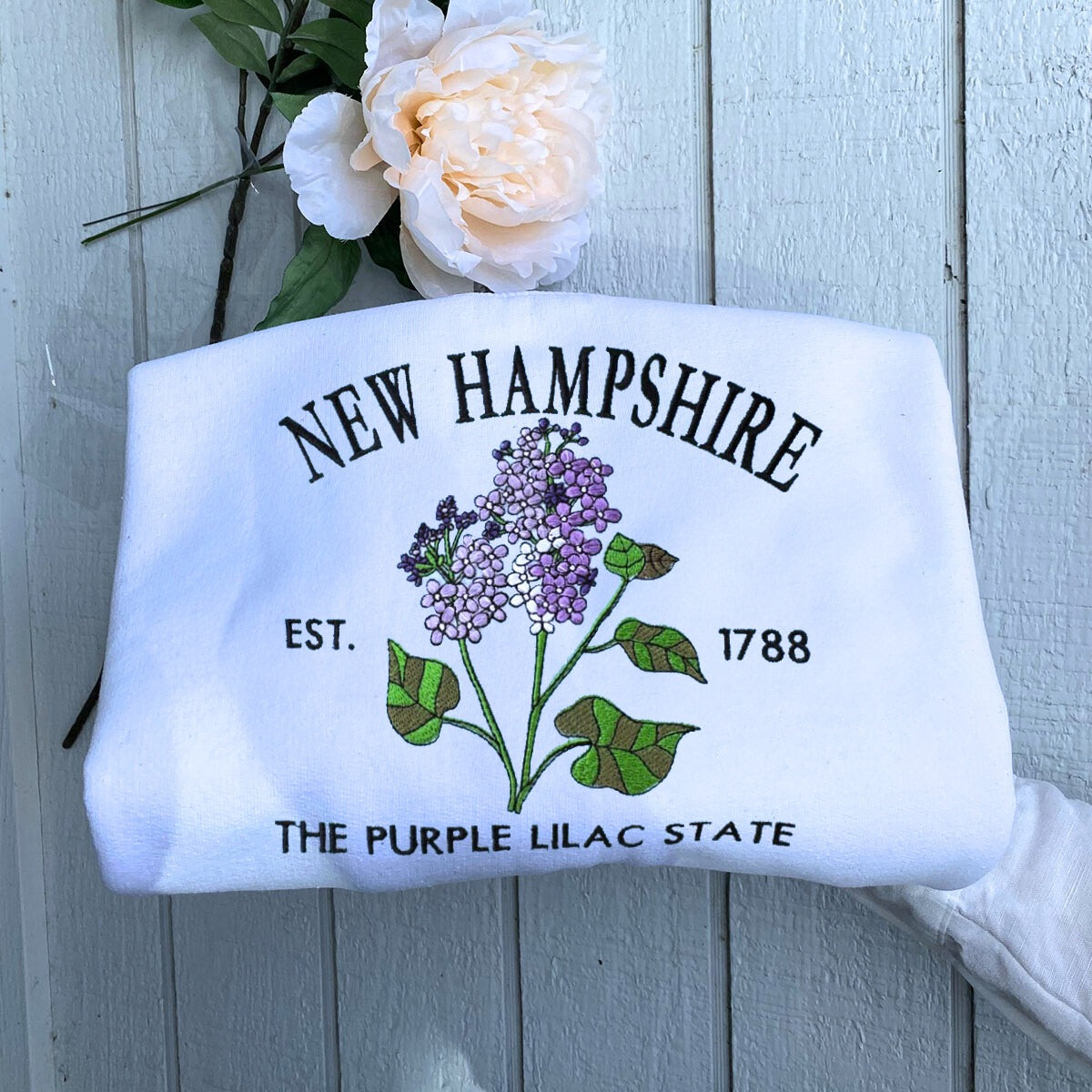 Embroidered New Hampshire State Purple Lilac Sweatshirt - Granite Floral Tribute