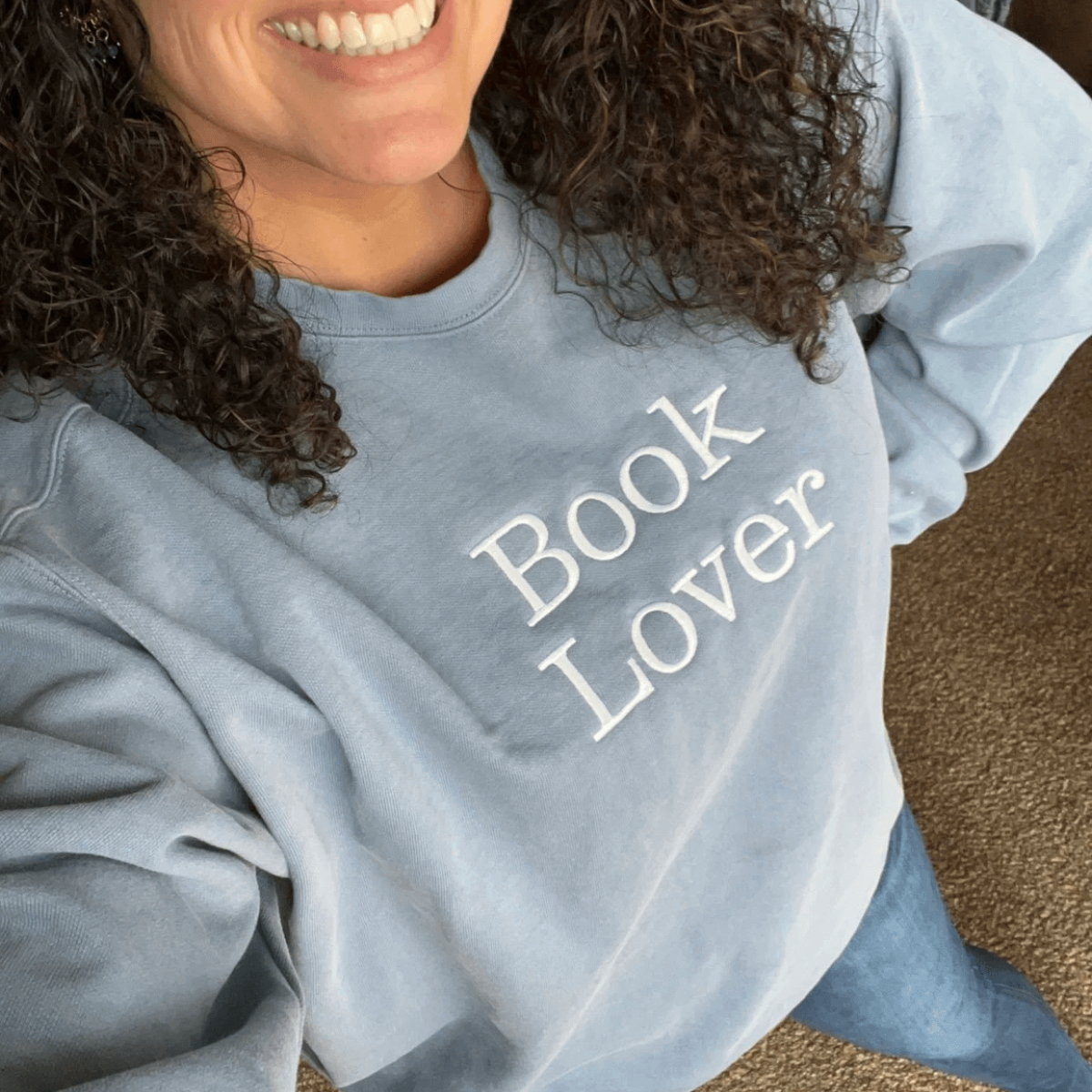 Cozy Book Lover Embroidered Sweatshirt