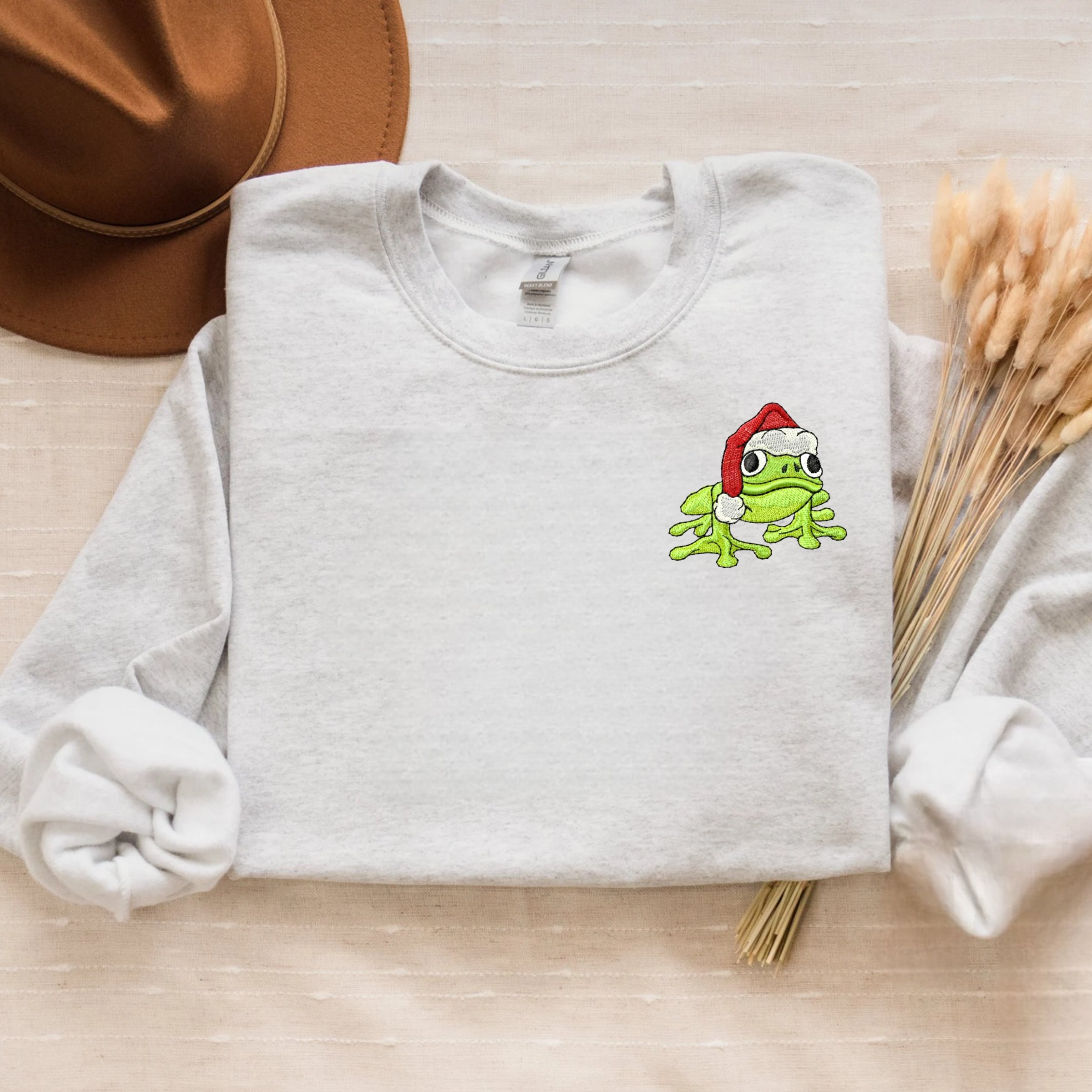 Embroidered Christmas Frog Sweatshirt with Santa Hat Design
